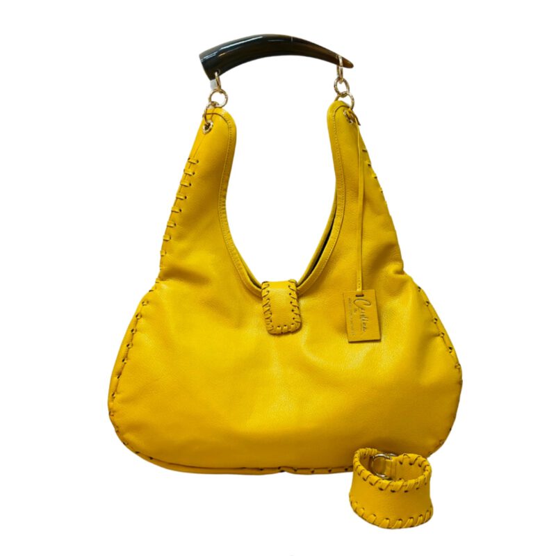 Bolso artesanal en piel de vaca amarillo y cuerno